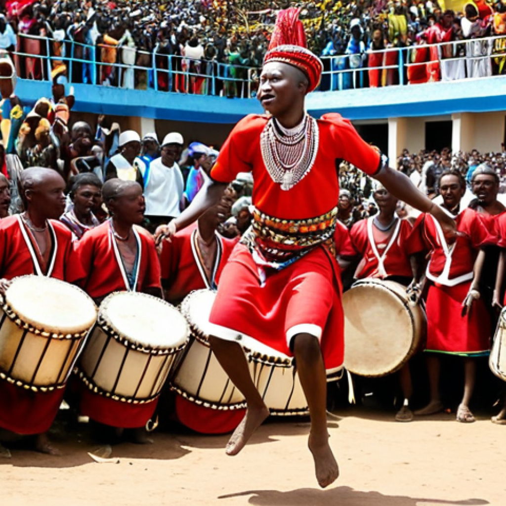 Intore Dance**

"Dynamic scene of Intore warriors performing. Focus on high jumps, energetic movements, vibrant traditional clothing, and the intensity of the drum rhythms. Gikongoro festival setting with a powerful atmosphere. Capture the pride and unity of the Rwandan people."

**